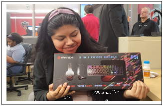 Haley Reyes holding a keyboard box