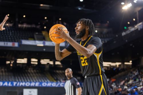 men's basketball photo used to promote athletic event 